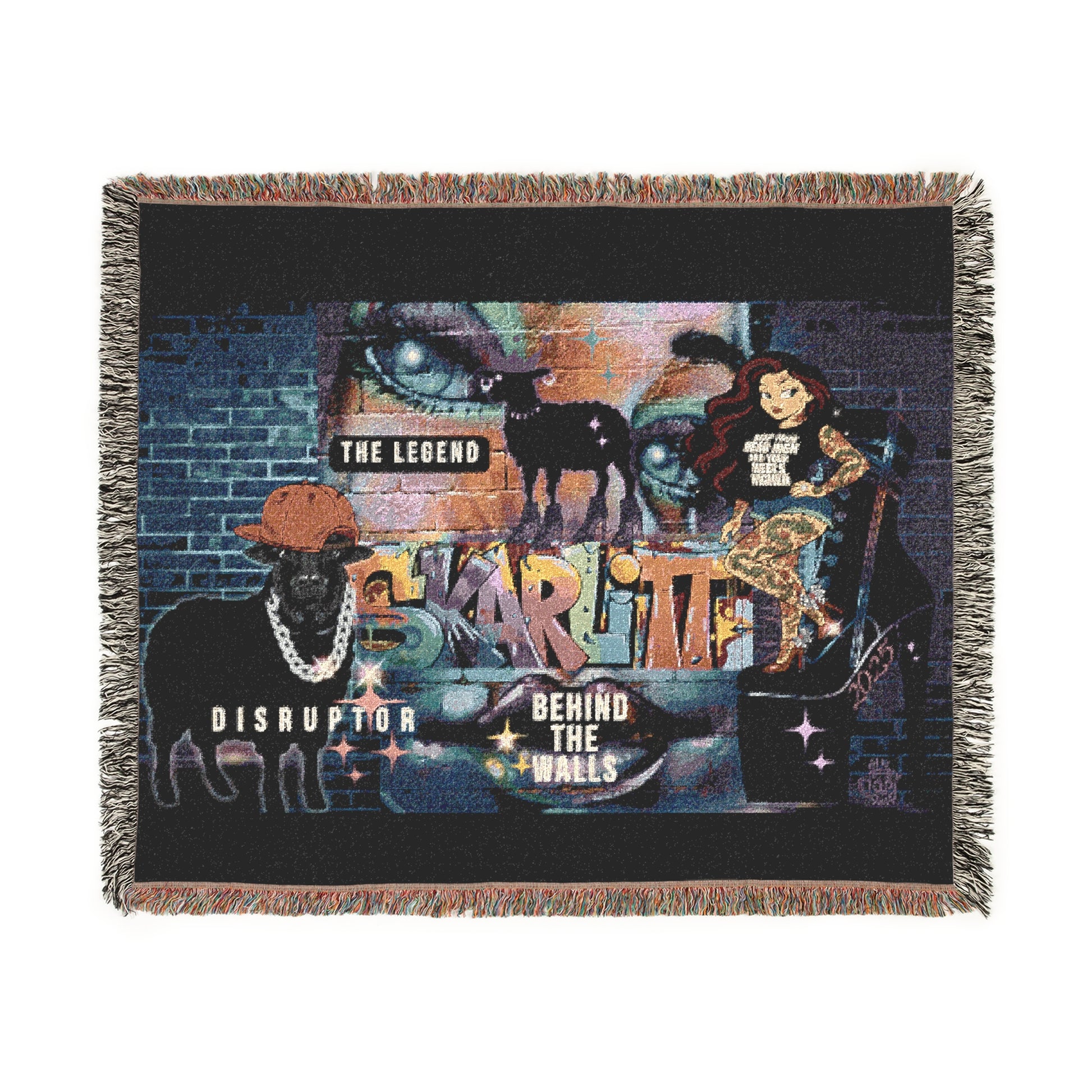 Woven blanket with artistic design featuring animals and text on a black background